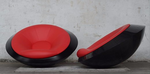 This futuristic chair rocks, spins, and flips