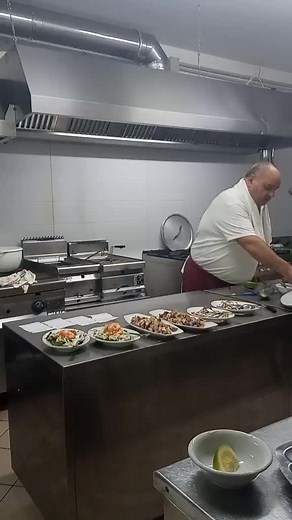 Expert Seafood Cooking Techniques in a Professional Kitchen