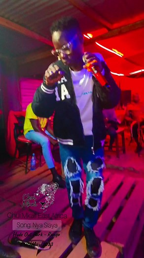 MacAjudo Performing Nya Siaya live on stage.