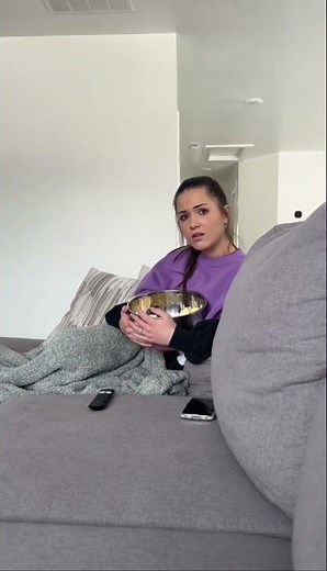 Sitting on the opposite side of the couch prank