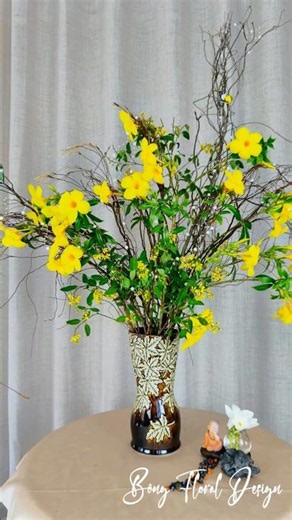 The soothing sensation of time slowing down with a yellow floral arrangement, little buddha #floral