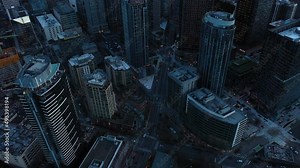 Overhead aerial of Seattle's downtown skyscrapers in the early morning.