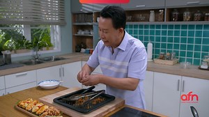 8.9K views · 275 reactions | Martin cooks a beautiful Steamed Squid With Squid Ink Sambal! Watch how he peels and cuts the squid, before mixing it with a spicy and tangy sauce. Served with noodles and a squid-ink infused sambal sauce, this dish is sure to delight your palate! | Asian Food Network | Facebook