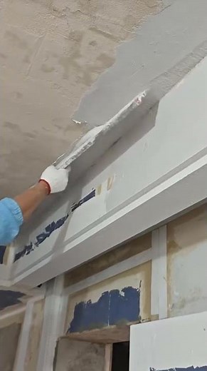 the process of plastering the ceiling of a room to cover the ceiling joints