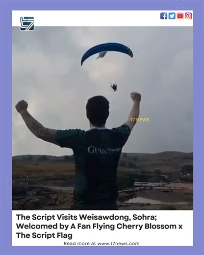 T7News Channel on Instagram: "Members of the world-renowned Irish band The Script were spotted at the breathtaking Weisawdong waterfalls in Sohra (Cherrapunjee) on Monday, where they were greeted by local fan Max Pyngrope, a passionate Paramorist from Shillong. In a heartwarming moment, Max waved a specially designed Cherry Blossom x The Script flag as the band enjoyed their day exploring the scenic surroundings. The flag symbolized a creative fusion of Meghalaya’s Cherry Blossom Festival spirit