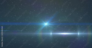 Animation of glowing blue light moving over spots of light and stars in background