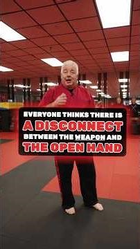 Disconnect between the weapon & the open hand! #fma #martialarts #selfdefense