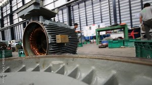 Activity of technician to working repair and fix induction motor in maintenance work shop