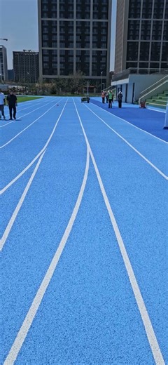 Vivid blue running track -- Polyaspartic system materials