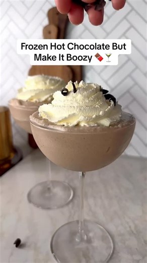 Cold, creamy, and totally indulgent—this Frozen Hot Chocolate Martini is basically dessert in a glass ☃️ Find this recipe by @makinze and more in the Delish app. | Delish