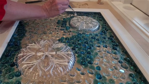 Everyone will be buying Dollar Store gems when they see her living room idea!