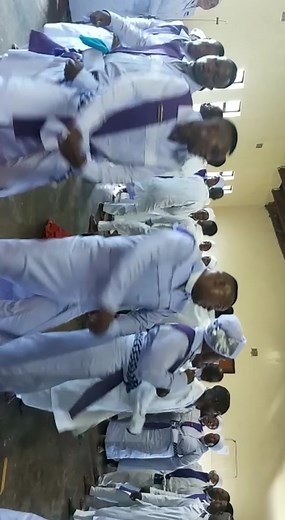 Coordinated Movement in Traditional White Robes