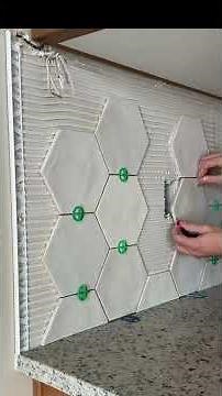 Kitchen splash back tiling installation #kitchen #tile