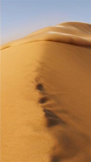 Sand to Silk: Sand suddenly turns into flowing silk fabric as the wind blow slandscape inslow motion