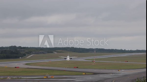 Stockholm, Sweden A commercial passenger airplane lands on the runway at Arlanda Airport.