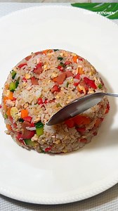 Hot Dog Fried Rice is a fun and flavorful Filipino-style fried rice made with savory hot dogs, garlic, eggs, and vegetables. This budget-friendly and easy-to-make dish is perfect for breakfast or any time you need a quick and satisfying meal! #HotDogFriedRice #FilipinoFood #PinoyBreakfast #EasyMeals #BudgetFriendly #FriedRice #HomeCooking #ComfortFood #QuickRecipes | Yummy Kitchen