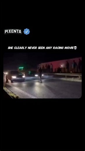 PIXENTA on Instagram: "POV: You skipped the tutorial😂 In racing movies like The Fast and the Furious, the race starter—often called a "flag girl"—is portrayed as the coolest, most composed person on the track, acting as the anchor between two high-powered machines. To do it correctly, she should have stood perfectly centered between the two front bumpers, maintaining a "dead zone" where the cars would roar past her without her needing to move an inch. The professional move involves making eye c
