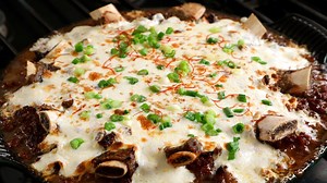 Cheese tteokgalbi (Minced, seasoned, and grilled beef ribs with...