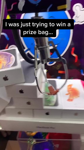 Unboxing iPhones from Claw Machines: A Surprising Haul!