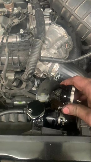 Car Engine Maintenance: Close-Up Component Inspection