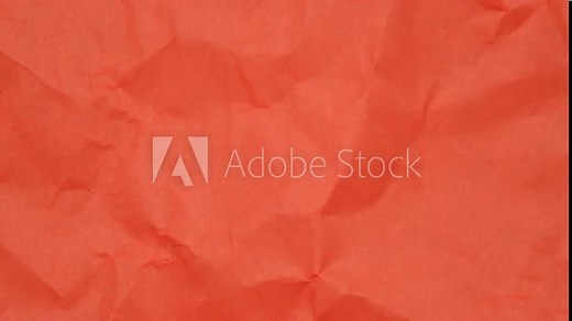 Red crumpled paper background animation. A crumpled piece of red paper texture. 4K resolution, seamless looping.