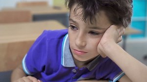 Close up of sleepy pupil at the lesson