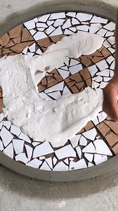 stonemason shapes ceramic shards. into an interesting whole. | Just Another Day | Facebook