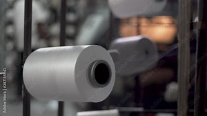 Closeup Of Cotton Thread Coming Off A Spool, Spinning Machine Rotating. Stock Video