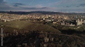 4K aerial of flying over a beautiful green forest in a rural landscape , Armenia