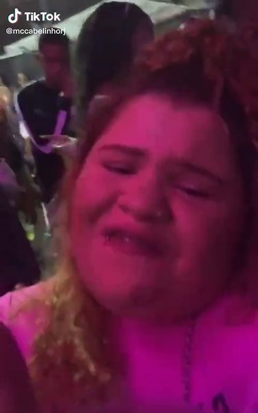 Casual Outdoor Gathering: Enjoying Drinks and Conversations