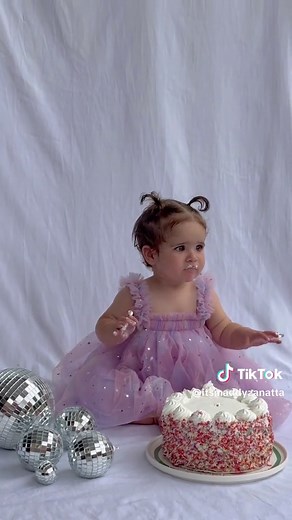Maddy Zanatta (@itsmaddyzanatta) - DIY cake smash for our babies first birthday 💜 We just used a white sheet and some disco balls from @Kmart Australia and a confetti cake fror @Coles #diyphotography #firstbirthday #cakesmashphotography #cakesmash #cakesmashideas #cakesmashprops #1stbirthdayphotoshoot #firstbirthdayphotoshoot #firstbirthdayphotos