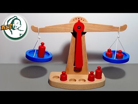 Play with balance scale to learn concept of balance