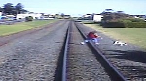 TasRail has released dozens of videos of near misses at rail crossings, amid a call for better driver and pedestrian behaviour.