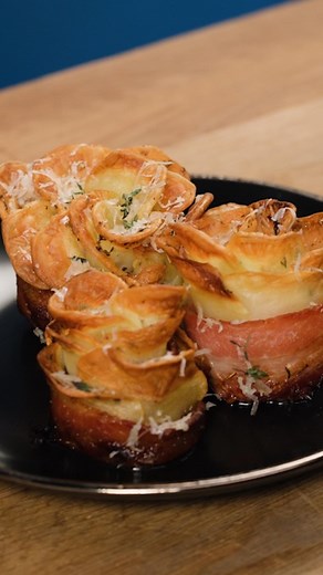 Tasty on Instagram: "Personally, I'm giving these Potato Roses to Samwise Gamgee ❤️‍🔥 Made by @whisperofyum. Find the recipe below & linked in bio Ingredients for 6 servings 4 yukon gold potatoes, halved 2 tablespoons olive oil 1 teaspoon garlic powder 1 teaspoon dried thyme 1 teaspoon dried rosemary ½ teaspoon black pepper 1 teaspoon salt 12 strips center cut bacon fresh thyme, to serve grated parmesan cheese, to serve Preparation Preheat oven to 400˚F (200˚C). Using a mandolin and a hand guar