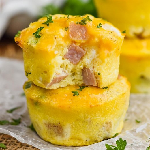 These Ham and Cheese Egg Muffins are only 120 calories each and freeze great! https://www.simplejoy.com/ham-and-cheese-egg-muffins/ | Simple Joy