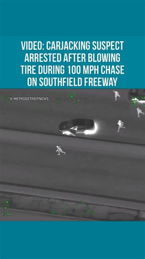 🚨New video from Michigan State Police’s Trooper 2 helicopter shows the moment a carjacking suspect ran across the freeway before being tased and arrested. Read more: themetrodetroitnews.com/video-carjacking-suspect-arrested-after-blowing-tire-during-100-mph-chase-on-southfield-freeway | Metro Detroit News