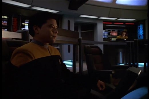 Starfleet Records. Starfleet Personnel: Kathryn M. Janeway, Captain of the USS Voyager. Temporal Agent: Captain Braxton. Starling says he knows they are from the future and that they are there to take the timeship. Janeway and Chakotay tell him that if he launches the timeship he will cause an explosion that will destroy the solar system. Janeway's combadge beeps. Harry Kim says they have an uplink established and Janeway tells him to start. Starling grabs the combadge and orders Kim to abort th