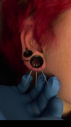 Triple Lobe Piercing with Spikes: Advanced Techniques