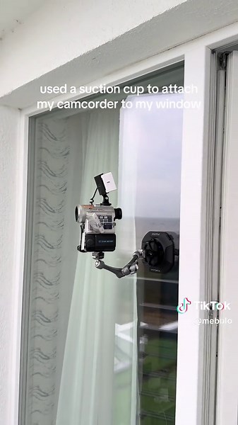 Camcorder Setup with Suction Cup on Window