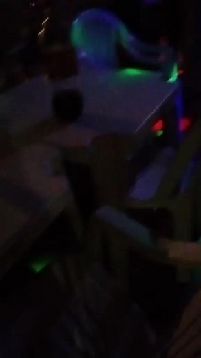 Exciting Indoor Party Scene with Dancing and Decorations