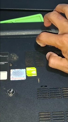 Tombol tuas pembus batre laptop