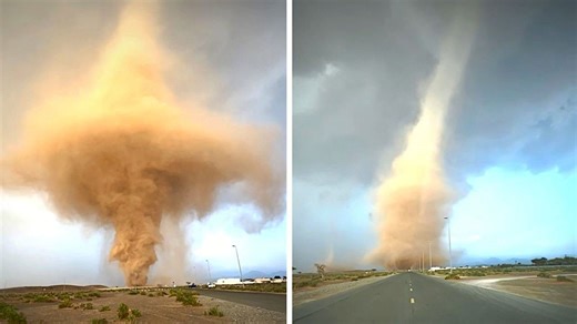 Towering sand tornado tears through desert in UAE