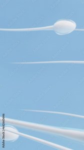 Human sperm cells, 3d rendering. 4K looped animation.Human sperm moving to the right on a blue background.