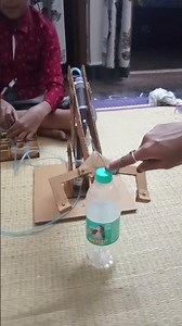 hydraulic powered robotic arm from cardboard and syringes/ my school project
