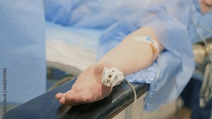 Preparing a woman for surgery and administering anesthesia for safety during surgery.