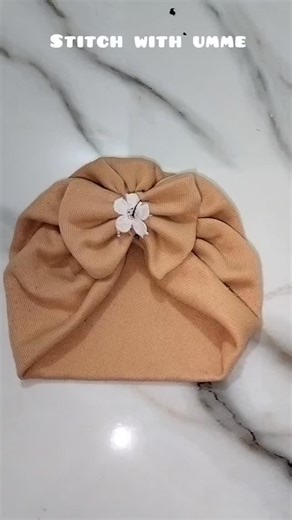 Stitch with umme on Instagram: "Create a short vertical Instagram Reel (7–10 seconds). Scene 1 (1 second): Show plain fabric on a clean white background. Add text on screen: "😱 Simple kapda…" Scene 2 (3 seconds): Quick cuts of hands stitching, cutting fabric, adding lace. Close-up shots, satisfying stitching process. Add text: "Bas thodi si silai ✂️" Scene 3 (3 seconds): Reveal the final baby dress / baby cap. Slow zoom, soft lighting. Add text: "➡️ Cute baby dress ready 😍" Scene 4 (1–2 second