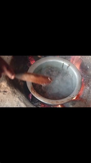 A cow's fresh blood cooked and eaten as food. Authentic village life.