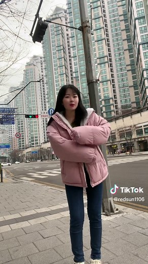 Urban Fashion Trends: Styling a Light Pink Puffer Jacket