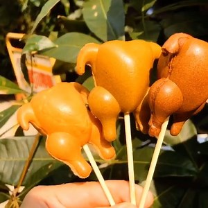 This café in Taiwan serves chicken-shaped egg cakes on a stick. 😍 | Insider Dessert