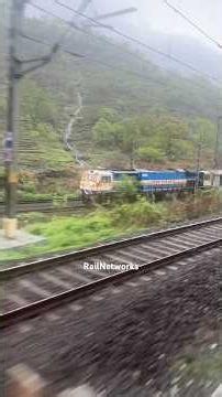 Mumbai Pune Deccan Express Parallel Run with Mumbai Local in Heavy Rain 🌧️🚆 | EMD Sound ❤️ #shorts